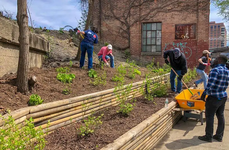 LGH members cleaning up a community garden
