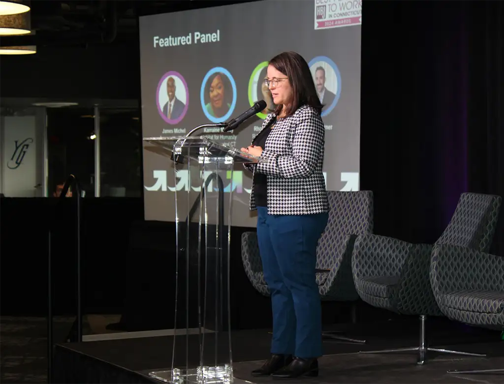 Larisa speaking at a LGH event